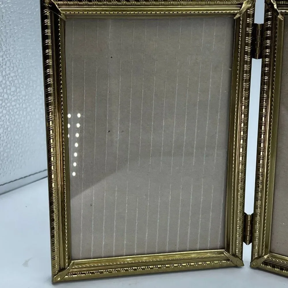 Vintage gold tone hinged double 5 X 7 frames